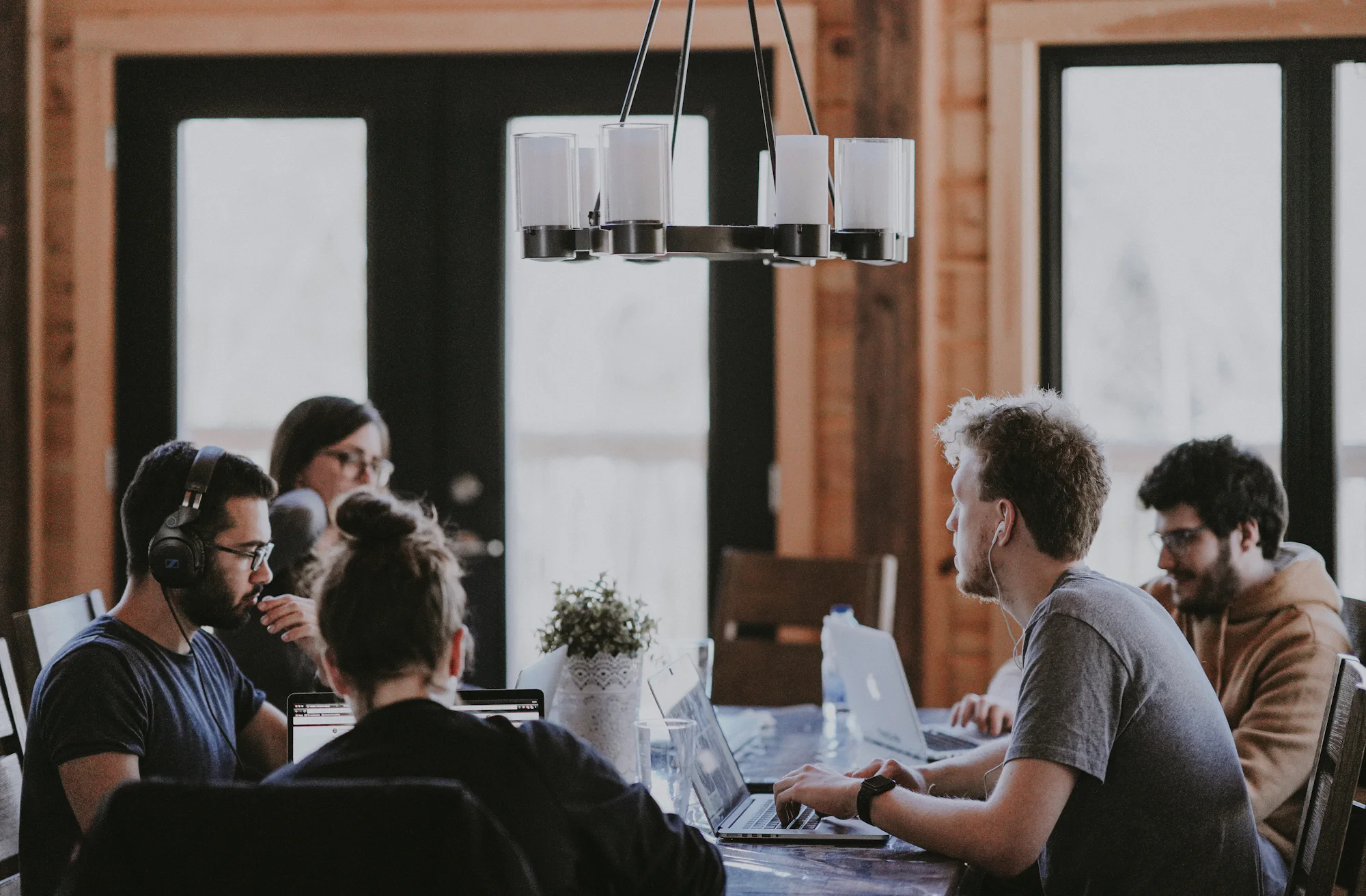 Team working together around a meeting table